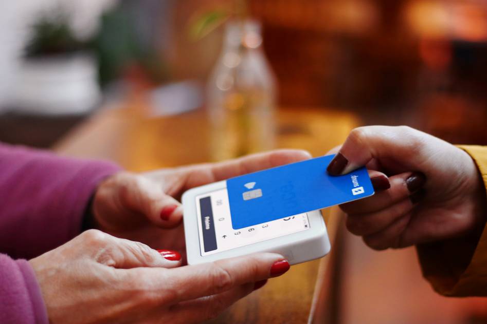 Couple planning finances using credit card tips